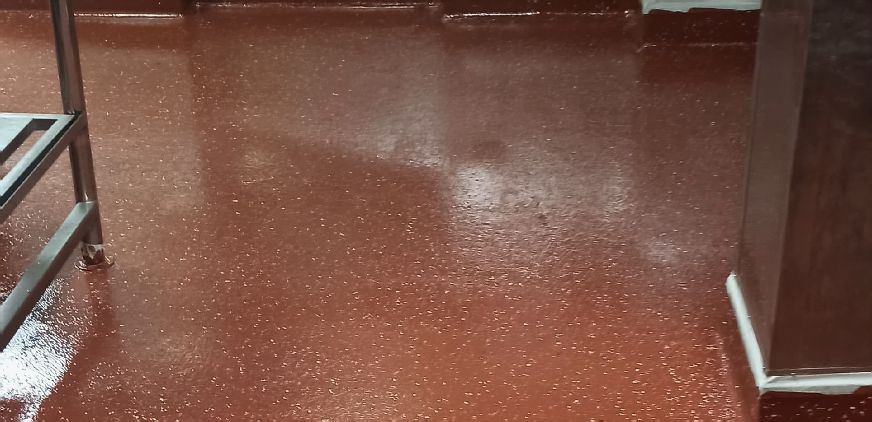 Red epoxy floor applied on a barge